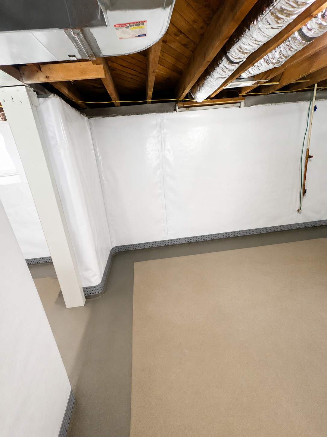 Basement waterproofing and moisture protection system